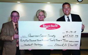 Strack & Van Til presents American Cancer Society with roundup donation