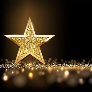 Golden sparkling star isolated on dark luxury horizontal background. Vector design element.