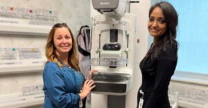 Erica Summerfield, mammography tech (left), and Janushi Dalal, MD, a fellowship-trained radiologist with Community Healthcare System (right), stand beside mammography equipment at an open house April 24 at the Valparaiso Health Center of St. Mary Medical Center to celebrate the expanded Women’s Diagnostic Center. 